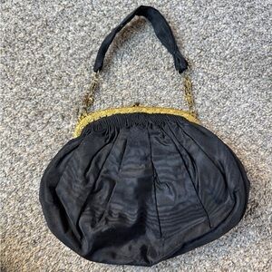 Elegant Black and Gold Women's Handbag